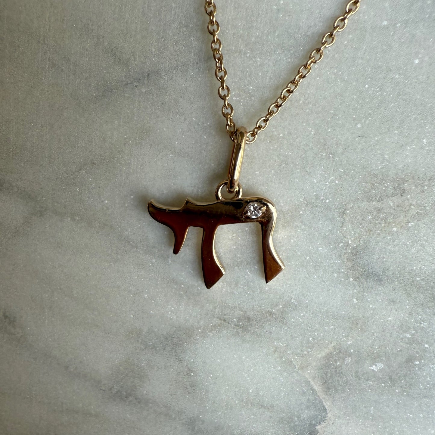 Chai Pendant with one Diamond - "Rom"