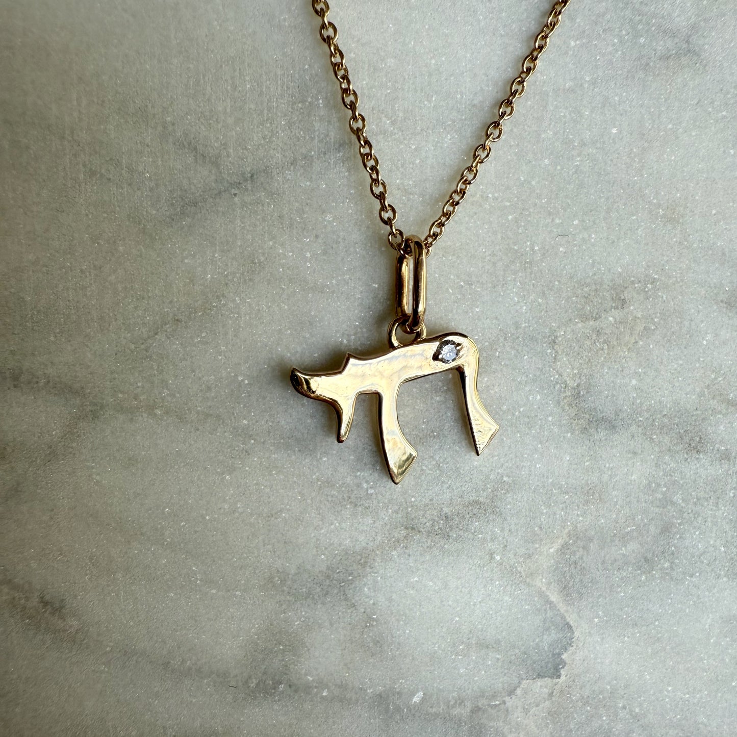 Chai Pendant with one Diamond - "Rom"