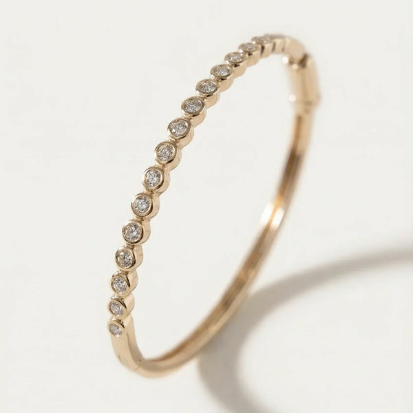 Chloe Bezel-set Diamonds Bangle | Jewelry in Solid Gold — Goldie Paris Chloe Bezel-set Diamonds Bangle | Jewelry in Solid Gold — Goldie Paris